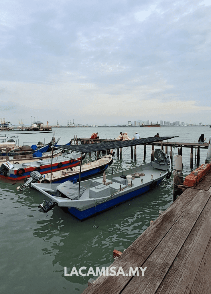 Boats lined up at the end of Chew Jetty Penang
