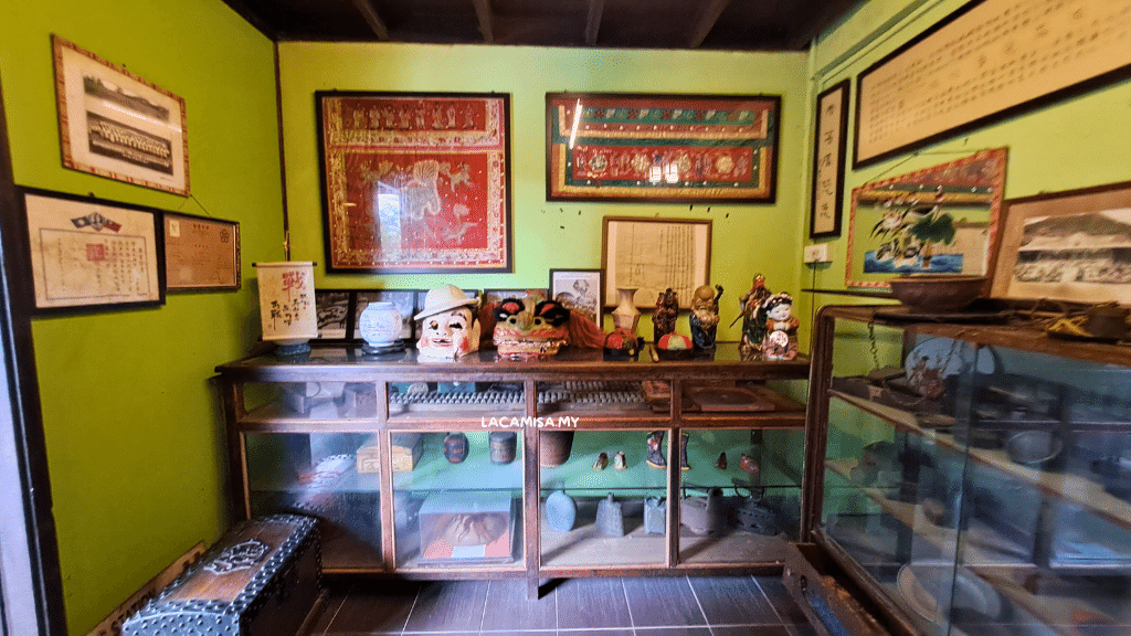 Traditional Chinese masks on the shelves.