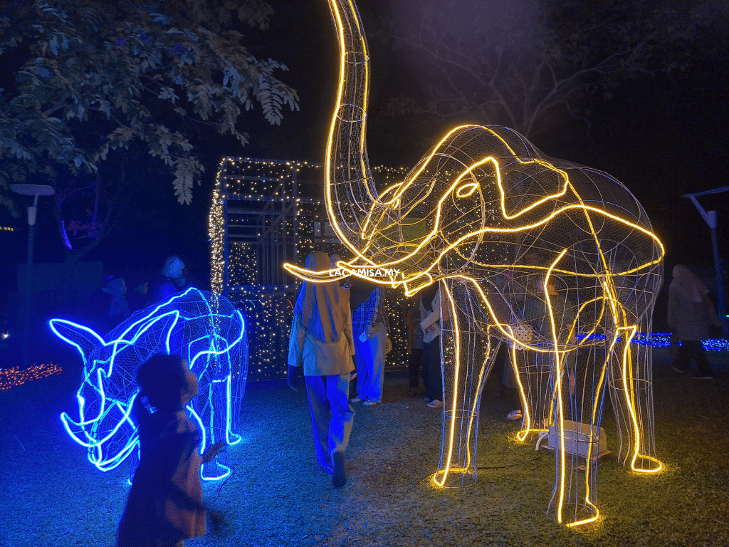 Illuminated sculptures of an elephant and a rhinoceros at light festival putrajaya