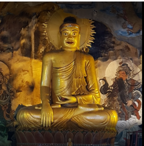 The large Buddha statue in Sam Poh Tong Cave Temple. Photo credited to TripAdvisor.com.