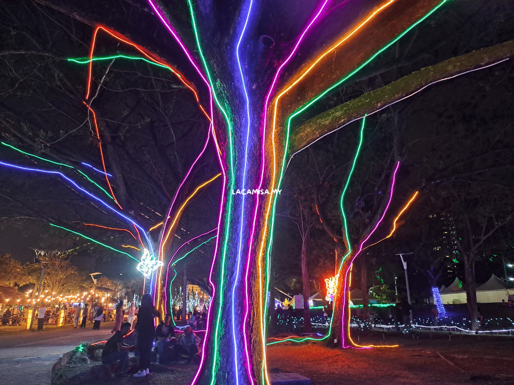 Rainbow colored trees can also be found during the light festival