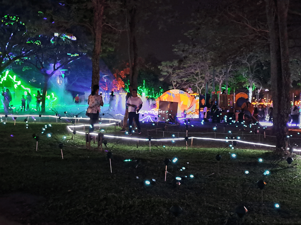 The illuminated pathways alongside cute blue colored lights that swinging back an forth during lantern festival putrajaya