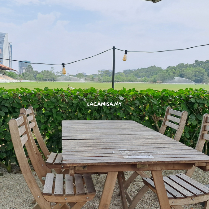  A cozy outdoor seating area in Ekues Cabin Cafe Putrajaya