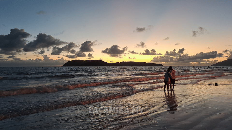 The charm of sunset in Cenang Beach accompanied by the stunning silhouette of the nearby islands.