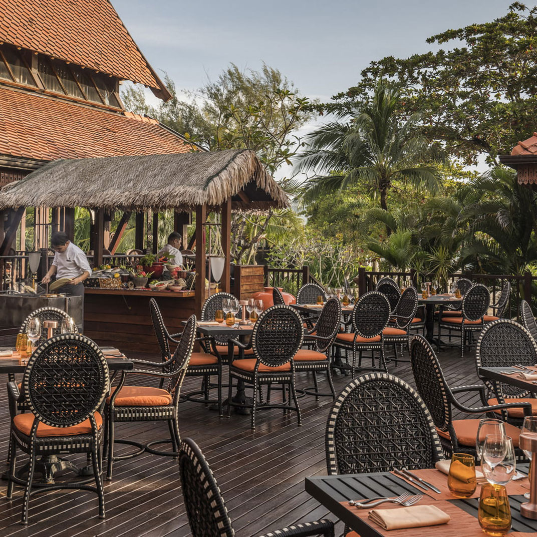 Four Seasons Langkawi is ideal for honeymooners because it features elegant villas, a tropical-inspired design, and romantic beachfront dining surrounded by nature (Image credited to guide.michelin.com)