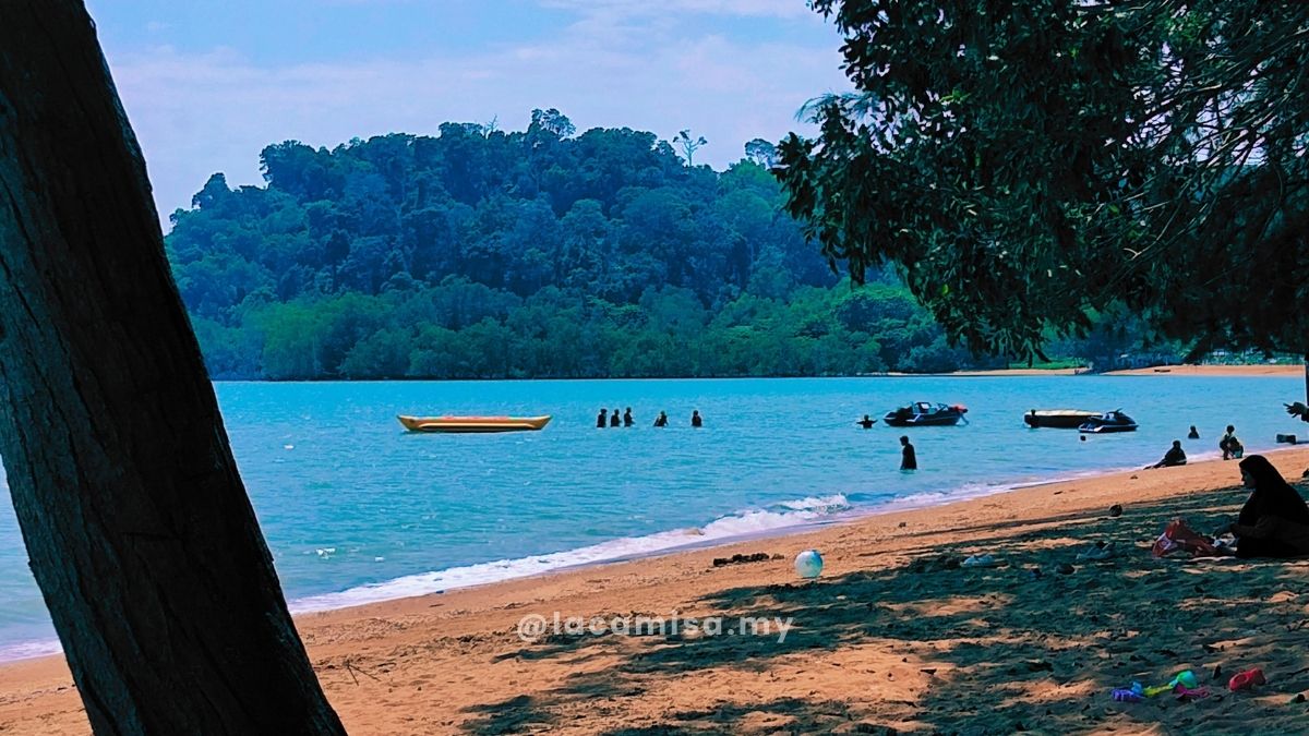 Banana boat ride from Teluk Kemang stopping at Monkey Bay Beach.