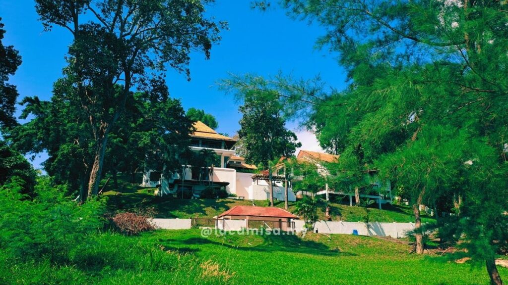 A stunning white villa just steps from the Monkey Bay beach.